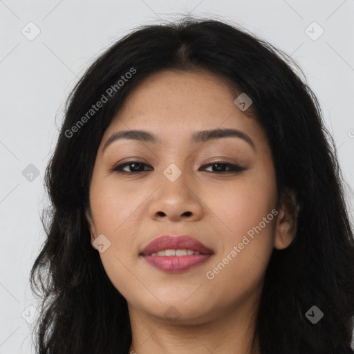 Joyful asian young-adult female with long  brown hair and brown eyes