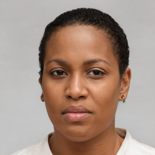 Neutral black young-adult female with short  brown hair and brown eyes