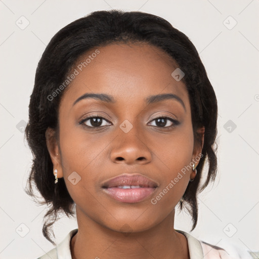 Joyful black young-adult female with medium  brown hair and brown eyes