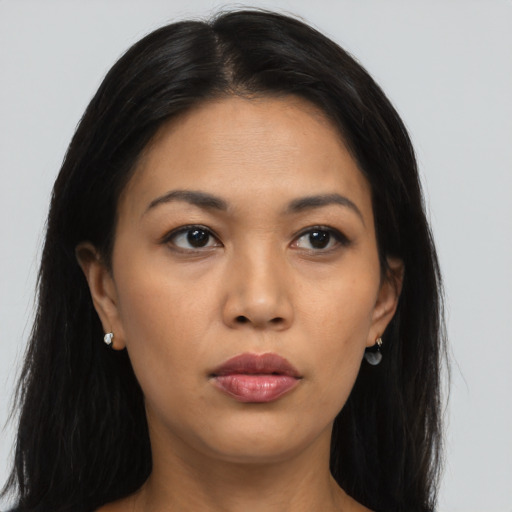 Neutral asian young-adult female with long  brown hair and brown eyes