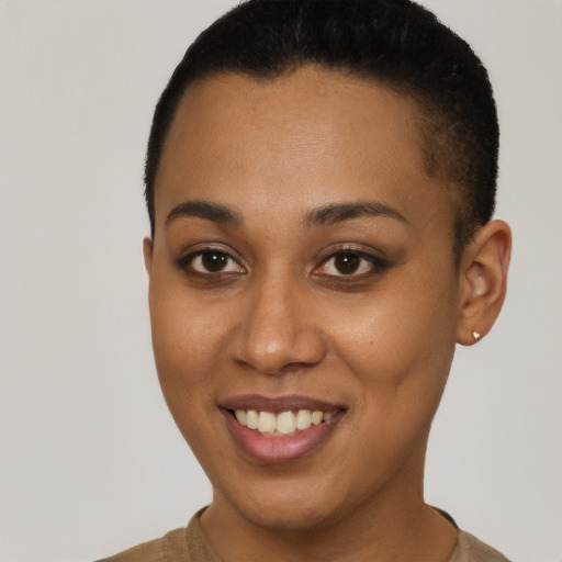 Joyful latino young-adult female with short  brown hair and brown eyes