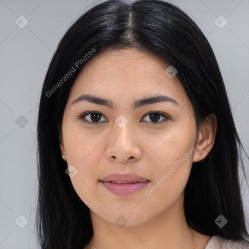 Joyful asian young-adult female with long  black hair and brown eyes