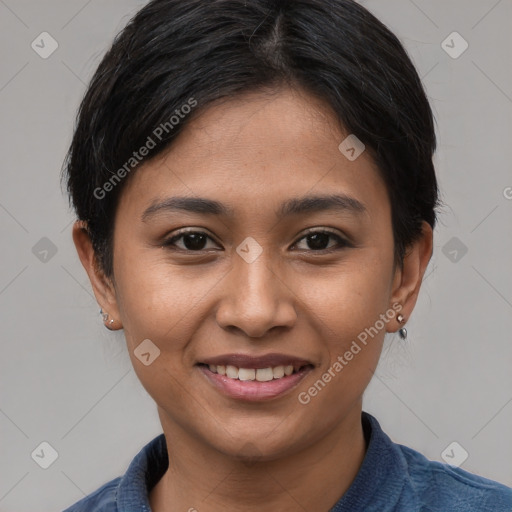 Joyful asian young-adult female with short  brown hair and brown eyes