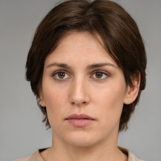 Neutral white young-adult female with medium  brown hair and brown eyes