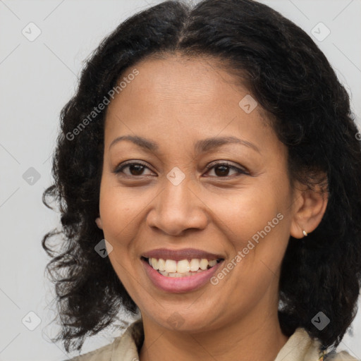 Joyful latino young-adult female with medium  brown hair and brown eyes