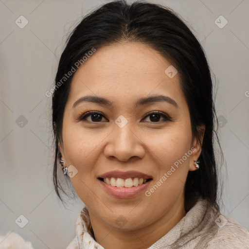 Joyful asian young-adult female with medium  brown hair and brown eyes