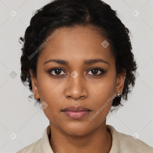 Joyful black young-adult female with medium  black hair and brown eyes