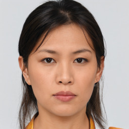 Neutral asian young-adult female with medium  brown hair and brown eyes