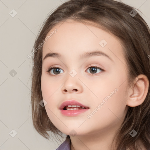 Joyful white child female with medium  brown hair and brown eyes