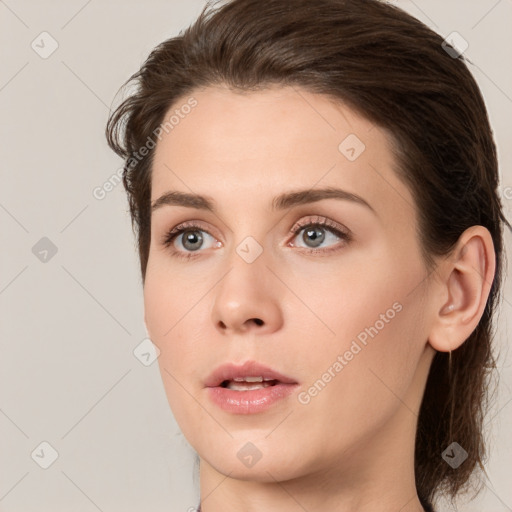 Neutral white young-adult female with medium  brown hair and brown eyes