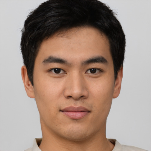 Neutral asian young-adult male with short  brown hair and brown eyes
