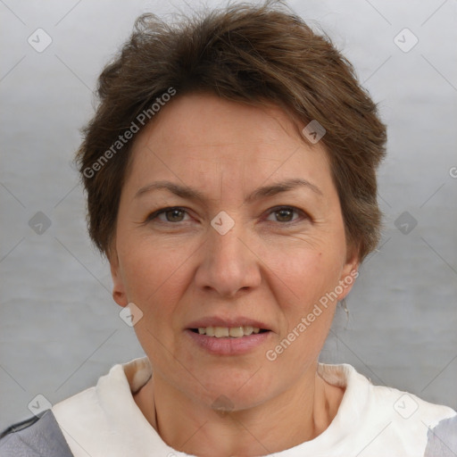 Joyful white adult female with short  brown hair and brown eyes