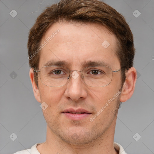 Joyful white adult male with short  brown hair and grey eyes
