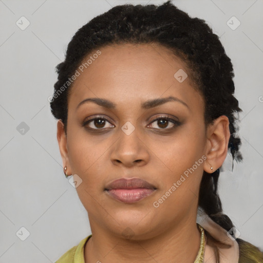 Joyful black young-adult female with short  brown hair and brown eyes