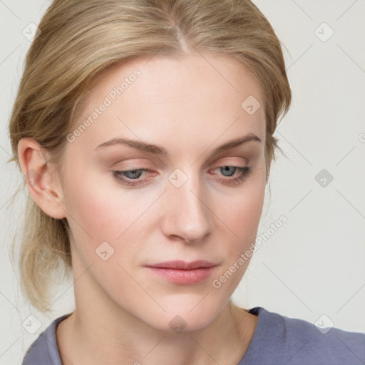 Joyful white young-adult female with medium  brown hair and blue eyes