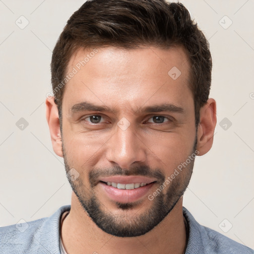 Joyful white young-adult male with short  brown hair and brown eyes