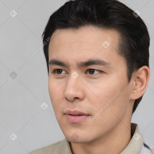 Neutral white young-adult male with short  black hair and brown eyes
