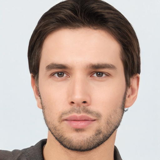 Neutral white young-adult male with short  brown hair and brown eyes