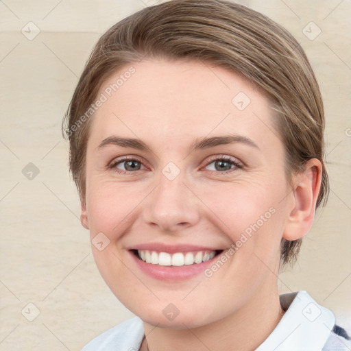 Joyful white young-adult female with medium  brown hair and green eyes