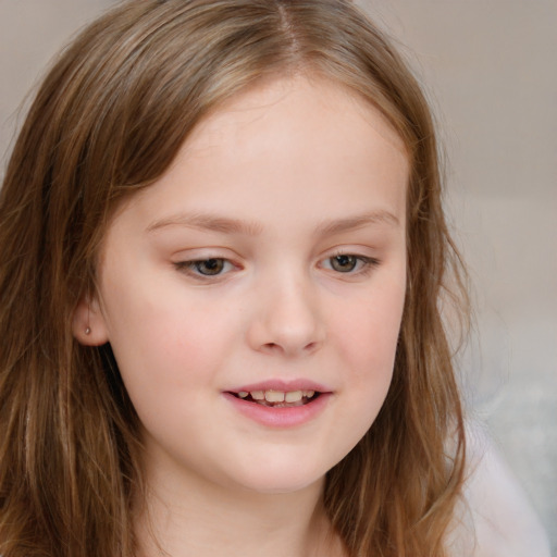 Joyful white child female with long  brown hair and brown eyes