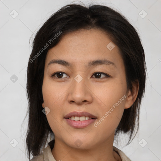 Joyful asian young-adult female with medium  brown hair and brown eyes