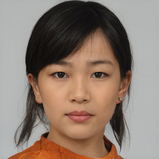 Neutral asian young-adult female with medium  brown hair and brown eyes