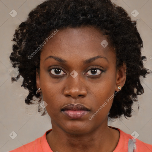 Neutral black young-adult female with medium  brown hair and brown eyes