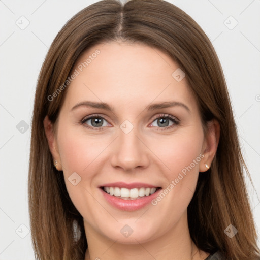 Joyful white young-adult female with long  brown hair and grey eyes