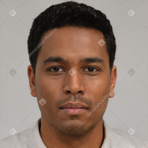 Neutral latino young-adult male with short  black hair and brown eyes