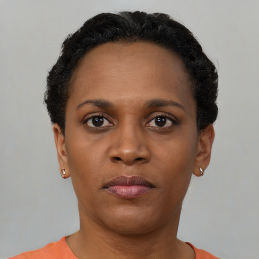 Neutral black young-adult female with short  black hair and brown eyes