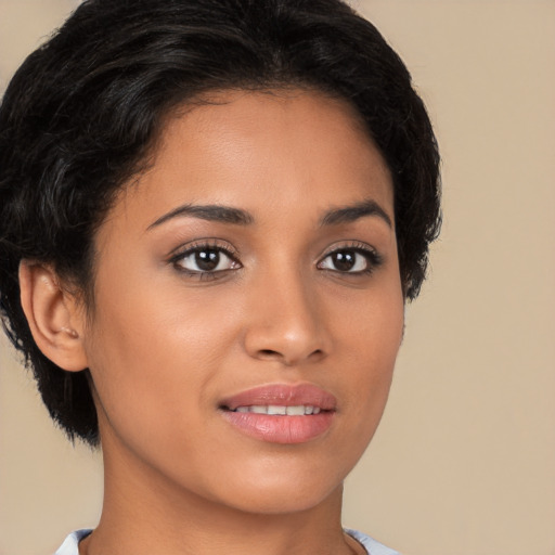 Joyful latino young-adult female with short  brown hair and brown eyes