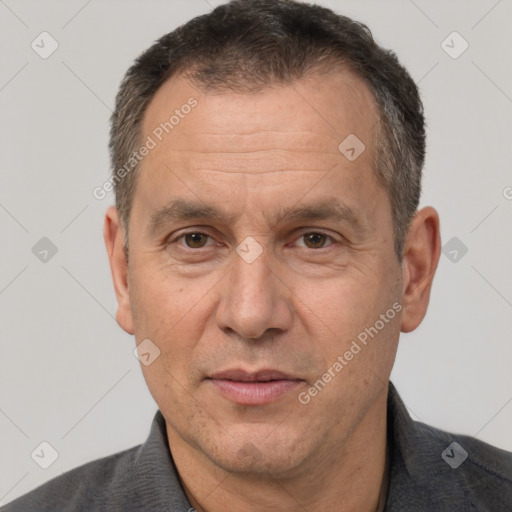 Joyful white middle-aged male with short  brown hair and brown eyes