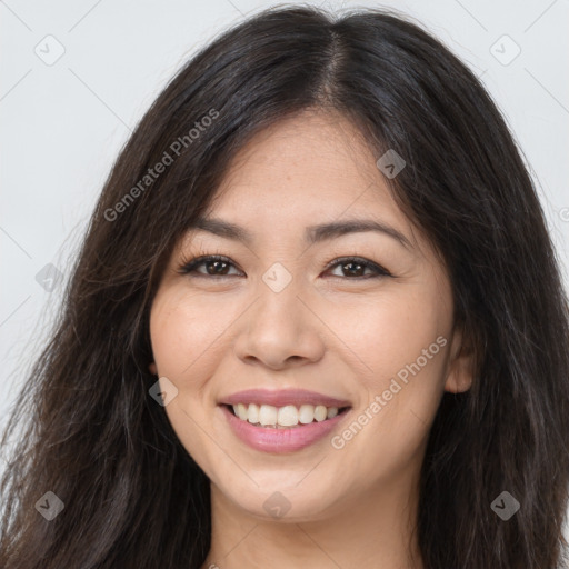 Joyful white young-adult female with long  brown hair and brown eyes