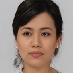 Neutral asian young-adult female with medium  brown hair and brown eyes