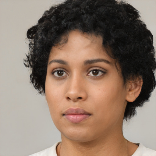 Neutral latino young-adult female with short  black hair and brown eyes