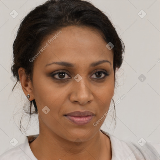 Joyful black young-adult female with medium  brown hair and brown eyes