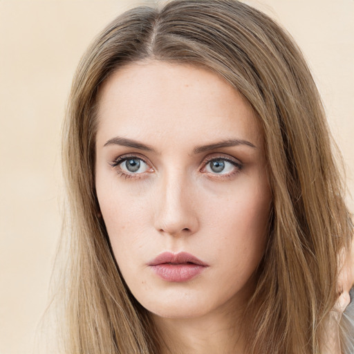 Neutral white young-adult female with long  brown hair and grey eyes