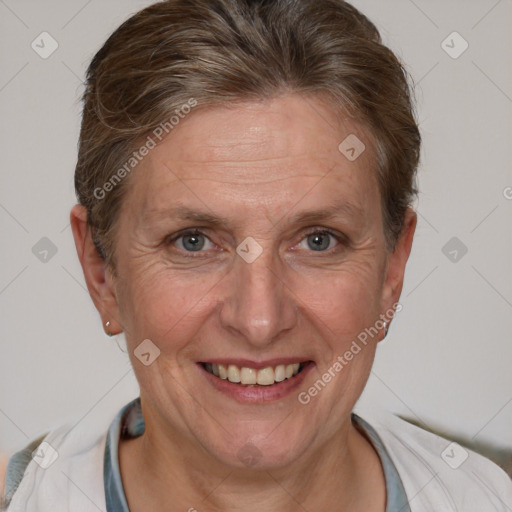 Joyful white adult female with short  brown hair and brown eyes