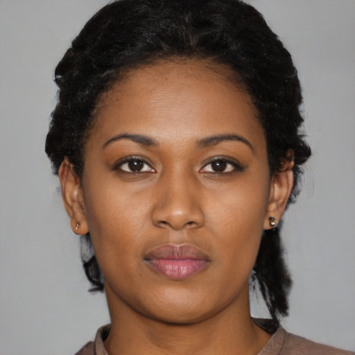 Neutral black young-adult female with short  black hair and brown eyes