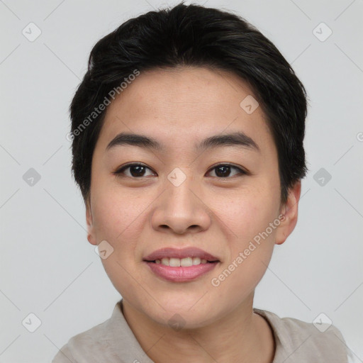 Joyful asian young-adult female with short  brown hair and brown eyes