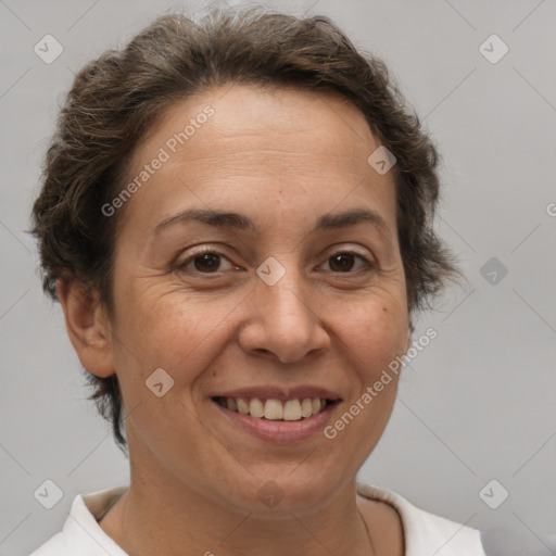 Joyful white adult female with short  brown hair and brown eyes