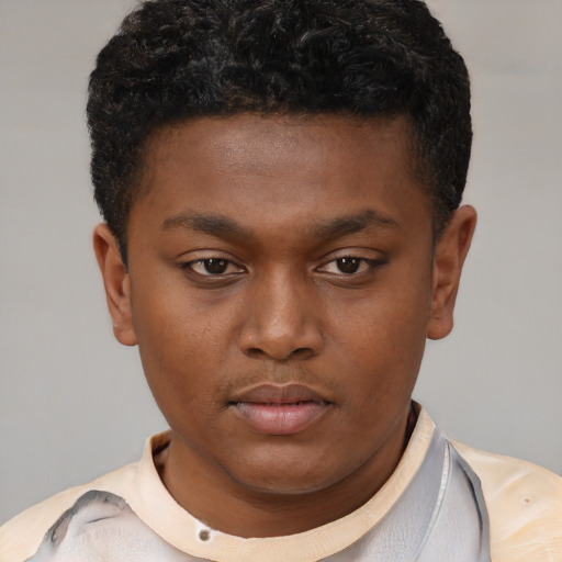 Neutral black young-adult male with short  brown hair and brown eyes