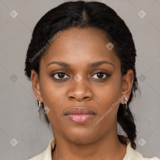 Joyful black young-adult female with medium  black hair and brown eyes