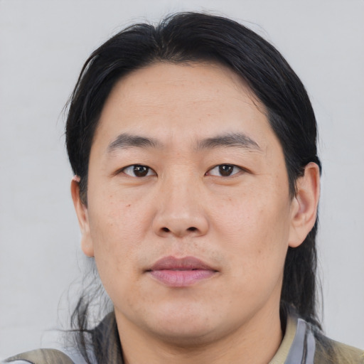 Neutral asian young-adult male with medium  black hair and brown eyes