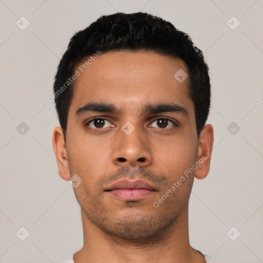 Neutral latino young-adult male with short  black hair and brown eyes