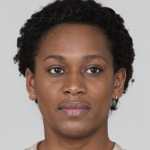 Neutral black young-adult female with short  brown hair and brown eyes