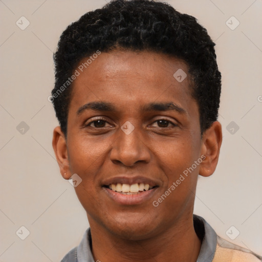 Joyful black young-adult male with short  black hair and brown eyes