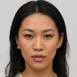 Neutral asian young-adult female with long  brown hair and brown eyes