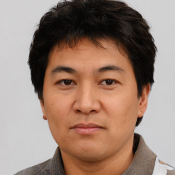 Neutral asian adult male with short  brown hair and brown eyes