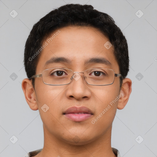 Joyful latino young-adult male with short  brown hair and brown eyes